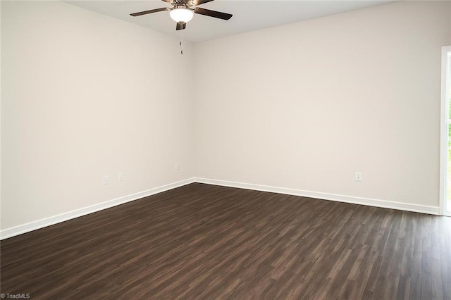 1100 Brooksridge Way, Whitsett, NC 27377 - unfurnished room featuring ceiling fan, baseboards, and dark wood-type flooring