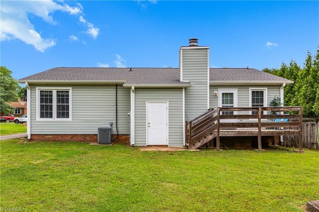 1118 Still Meadows Ln, King, NC 27021 - back of house with a deck, a lawn, and a chimney