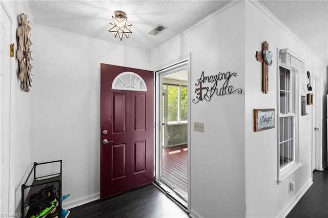 1118 Still Meadows Ln, King, NC 27021 - entrance foyer with dark wood finished floors, ornamental molding, baseboards, and a textured ceiling