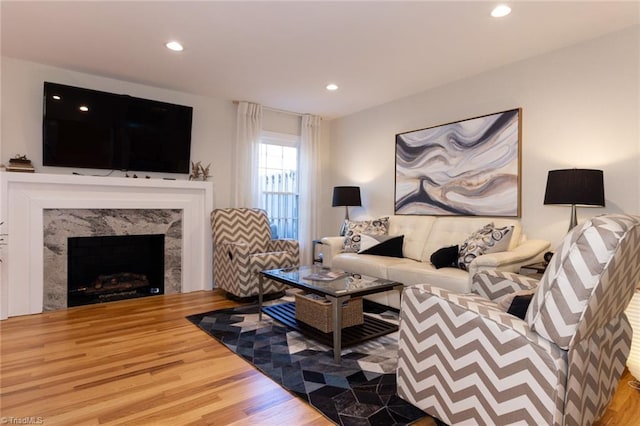 4166 Lytchfield Ct, Winston-Salem, NC 27104 - living room with wood finished floors, recessed lighting, and a fireplace