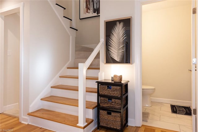 4166 Lytchfield Ct, Winston-Salem, NC 27104 - stairway featuring baseboards and wood finished floors