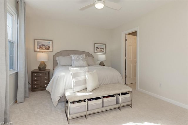 4166 Lytchfield Ct, Winston-Salem, NC 27104 - bedroom with baseboards, light colored carpet, and a ceiling fan