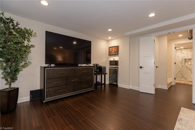 4166 Lytchfield Ct, Winston-Salem, NC 27104 - living area featuring recessed lighting, dark wood-style flooring, beverage cooler, and baseboards
