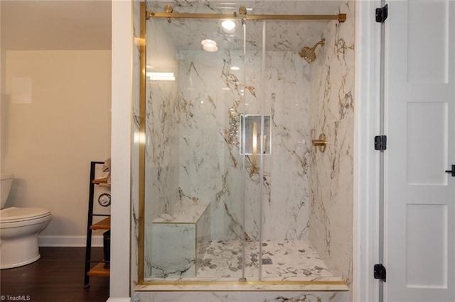 4166 Lytchfield Ct, Winston-Salem, NC 27104 - bathroom with toilet, a marble finish shower, wood finished floors, and baseboards