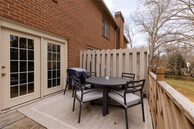4166 Lytchfield Ct, Winston-Salem, NC 27104 - wooden deck featuring outdoor dining area, grilling area, and french doors