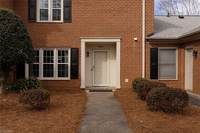 4166 Lytchfield Ct, Winston-Salem, NC 27104 - entrance to property featuring brick siding and a shingled roof