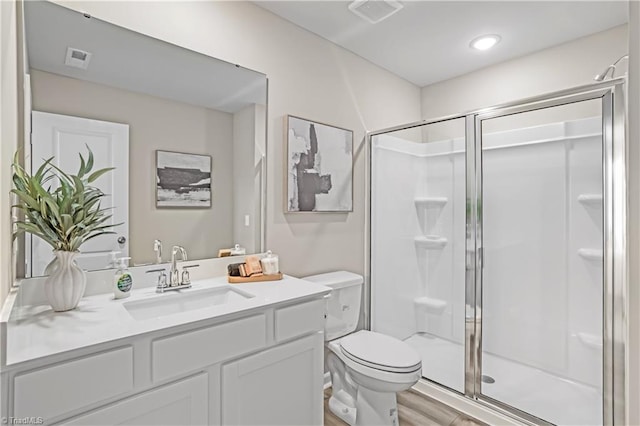 1868 Autumn Mist Dr, Winston-Salem, NC 27103 - full bathroom with a stall shower, vanity, and wood finished floors
