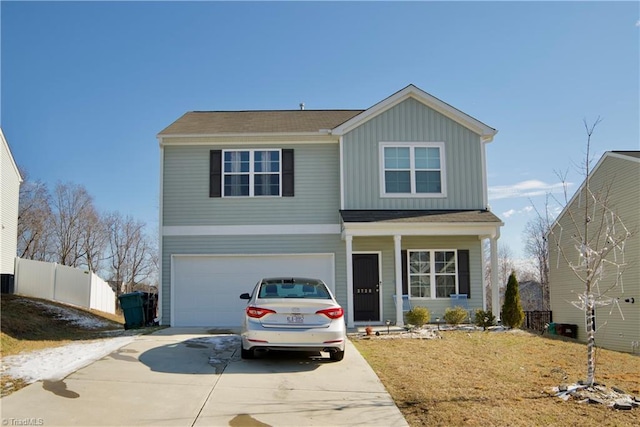 view of front of home with a garage, concrete driveway, board and batten siding, and fence