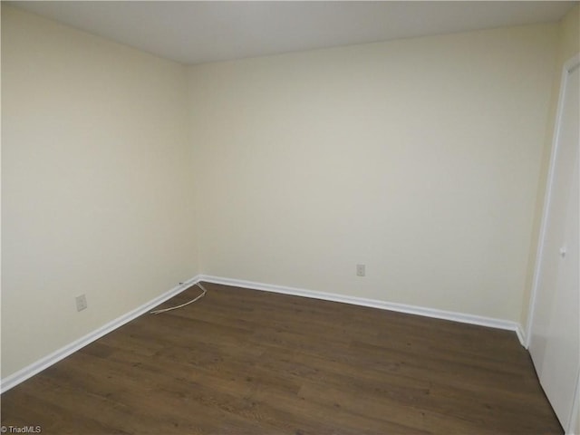 317 Westridge Dr, Yadkinville, NC 27055 - unfurnished room featuring dark wood-style flooring and baseboards