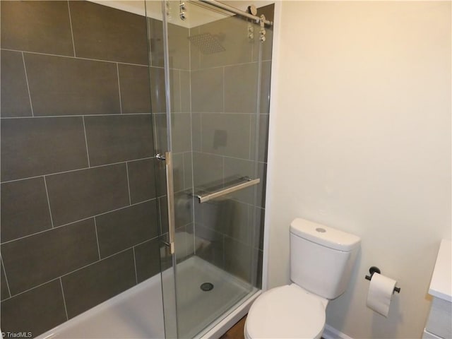317 Westridge Dr, Yadkinville, NC 27055 - bathroom featuring a stall shower, toilet, and vanity