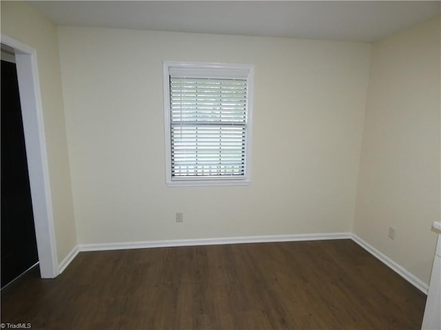 317 Westridge Dr, Yadkinville, NC 27055 - unfurnished room featuring dark wood-style flooring and baseboards