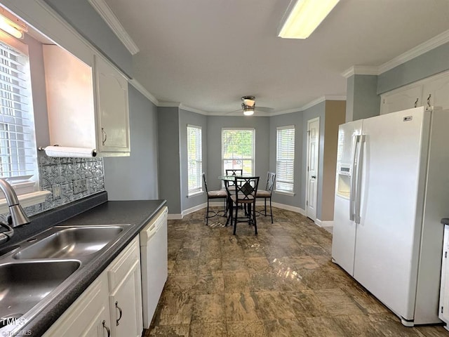 208 Mallard Creek Dr, Graham, NC 27253 - kitchen with a sink, a ceiling fan, white cabinetry, white appliances, and dark countertops