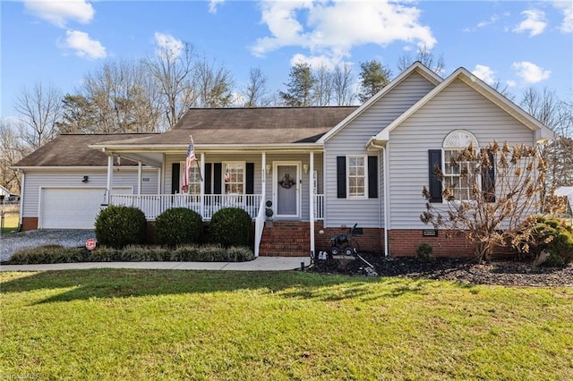 ranch-style home featuring a porch, a front yard, and a garage