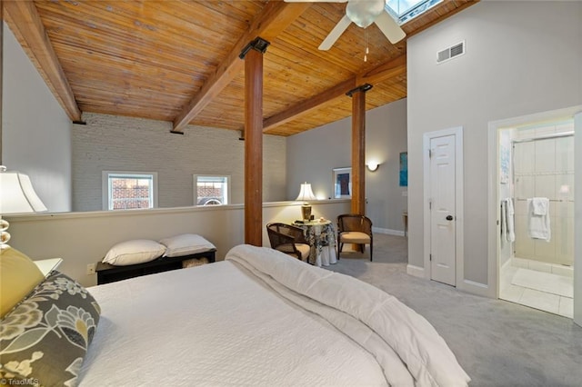 bedroom with visible vents, beamed ceiling, wooden ceiling, and carpet floors