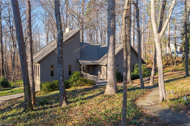 view of home's exterior with a chimney