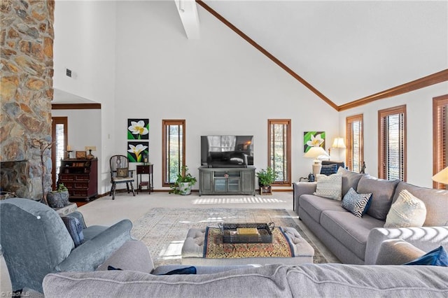 living room with crown molding, baseboards, light carpet, a fireplace, and high vaulted ceiling