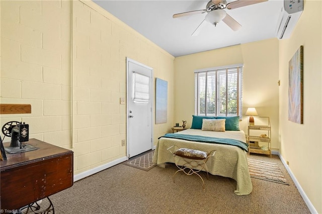 carpeted bedroom featuring baseboards, an AC wall unit, and a ceiling fan