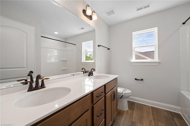 5751 Siler St, Trinity, NC 27370 - full bath featuring double vanity, baseboards, visible vents, and a sink