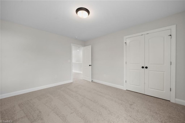 5751 Siler St, Trinity, NC 27370 - unfurnished bedroom featuring carpet floors, baseboards, and a closet