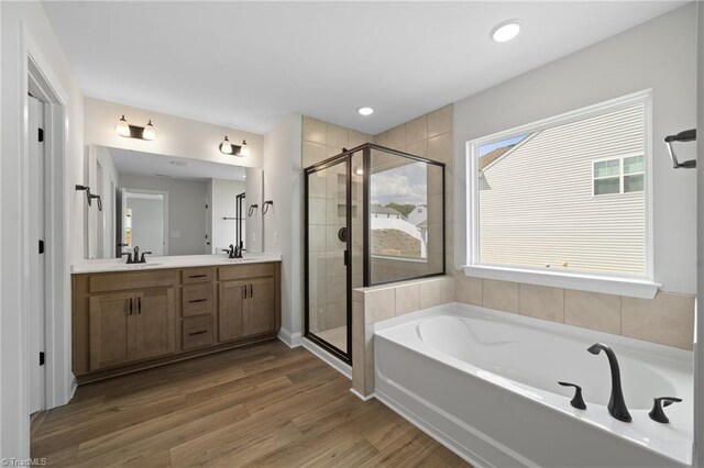5751 Siler St, Trinity, NC 27370 - bathroom with a sink, double vanity, a stall shower, and a garden tub
