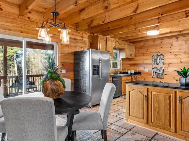 kitchen with stainless steel refrigerator with ice dispenser, wooden ceiling, beamed ceiling, dishwasher, and hanging light fixtures