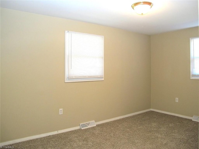 view of carpeted spare room