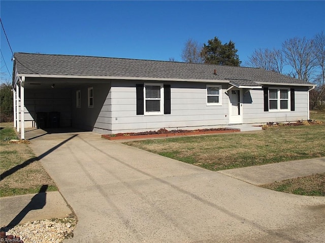 ranch-style house with a front lawn and a carport