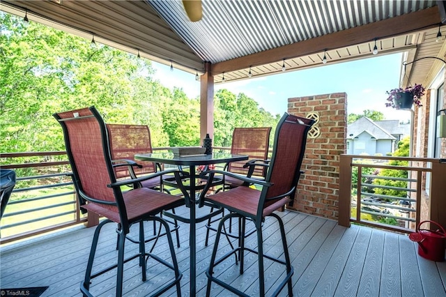 wooden deck with outdoor dining space