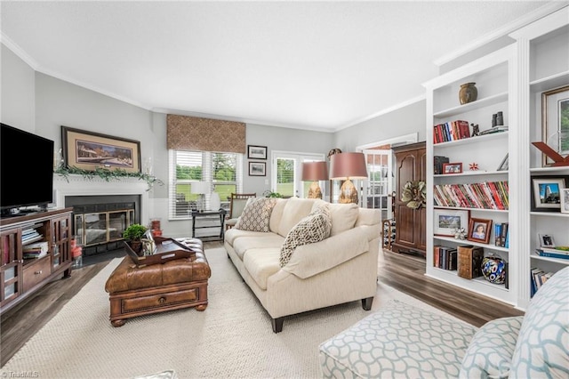 149 Warwicke Pl, Bermuda Run, NC 27006 - living room featuring ornamental molding, wood finished floors, and a fireplace with flush hearth