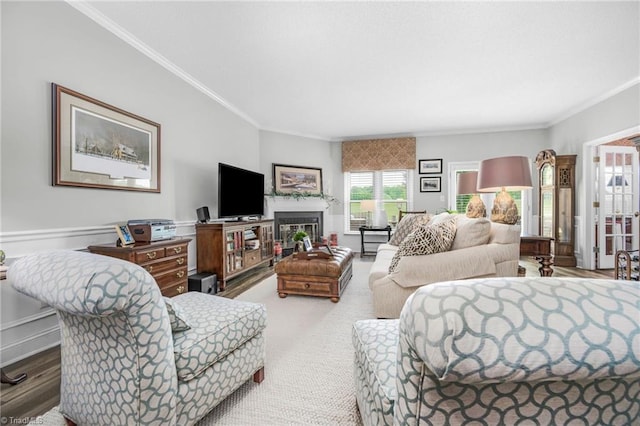 149 Warwicke Pl, Bermuda Run, NC 27006 - bedroom featuring crown molding, a fireplace, and wood finished floors
