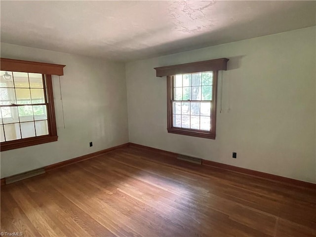 1706 Windsor Dr, High Point, NC 27262 - unfurnished room with wood finished floors and baseboards