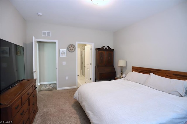 547 Historic Dr, Hillsborough, NC 27278 - bedroom featuring light colored carpet, baseboards, ensuite bath, and visible vents