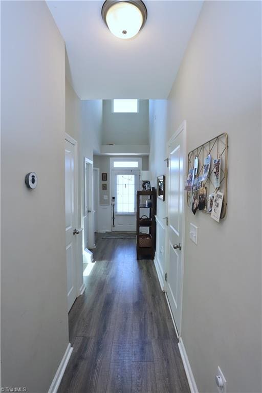 547 Historic Dr, Hillsborough, NC 27278 - corridor with a high ceiling, baseboards, and dark wood-style flooring