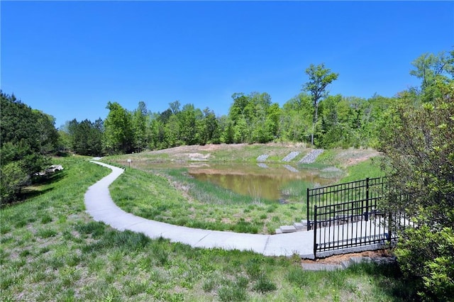 547 Historic Dr, Hillsborough, NC 27278 - view of property's community featuring fence, a wooded view, and a water view