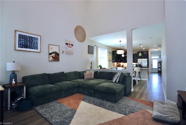 547 Historic Dr, Hillsborough, NC 27278 - living room featuring baseboards, wood finished floors, and a wealth of natural light