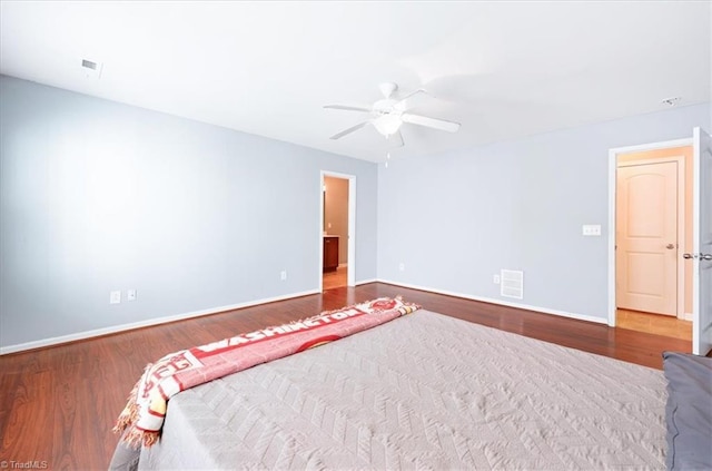 unfurnished bedroom featuring hardwood / wood-style flooring and ceiling fan