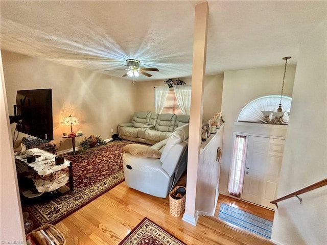 155 Page Farm Rd, Mount Airy, NC 27030 - living room featuring baseboards, a ceiling fan, and light wood-style floors