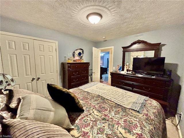 155 Page Farm Rd, Mount Airy, NC 27030 - bedroom with a textured ceiling and a closet