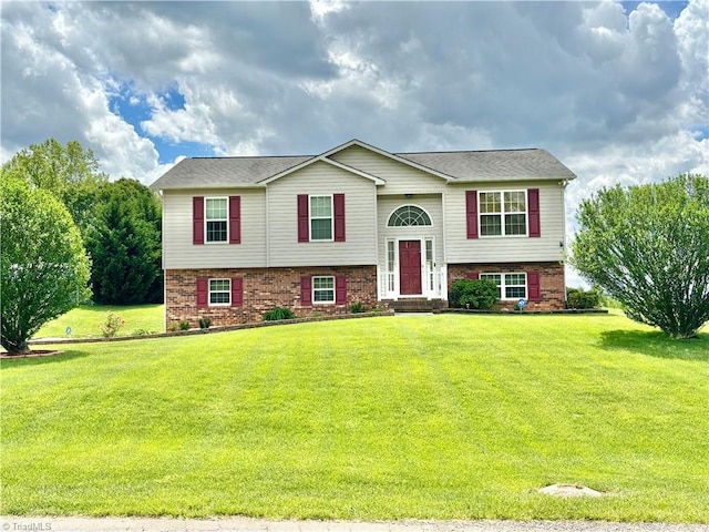 155 Page Farm Rd, Mount Airy, NC 27030 - raised ranch with a front lawn and brick siding