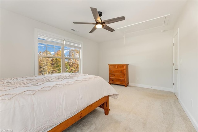 7722 NW Meadows Dr, Stokesdale, NC 27357 - bedroom with attic access, light carpet, and ceiling fan