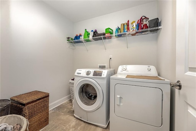 7722 NW Meadows Dr, Stokesdale, NC 27357 - washroom with independent washer and dryer and baseboards