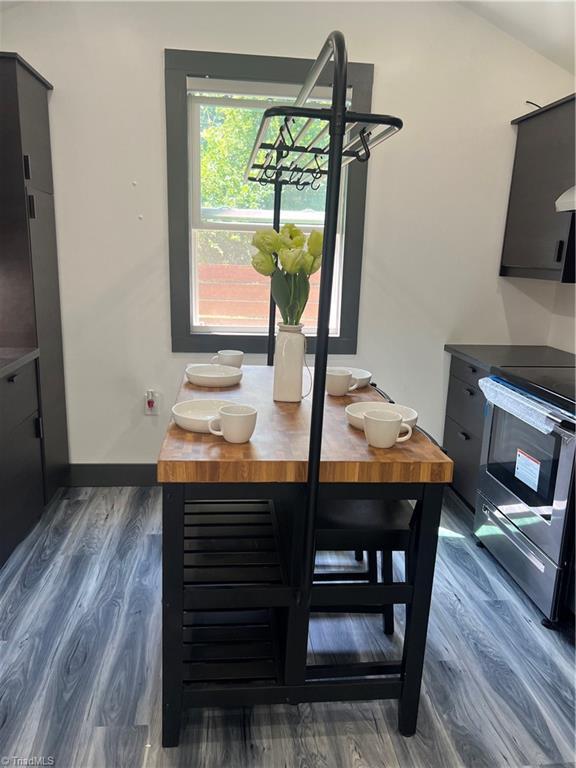 2042 Harrison Ave, Winston-Salem, NC 27105 - dining room with wood finished floors and baseboards