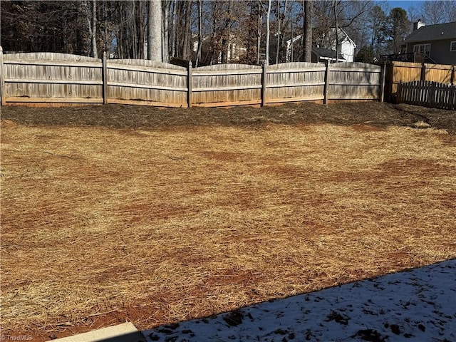 view of yard with fence