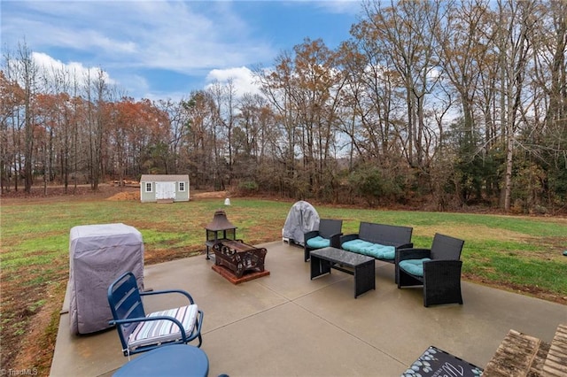 view of patio / terrace featuring a storage unit, area for grilling, and an outdoor hangout area