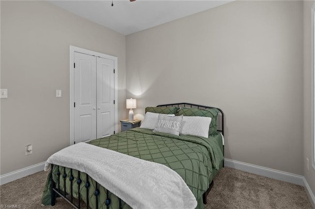 bedroom with carpet floors and a closet