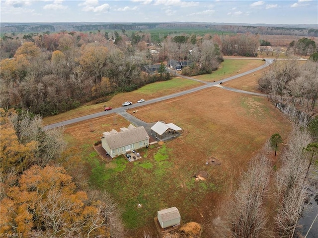 birds eye view of property featuring a rural view