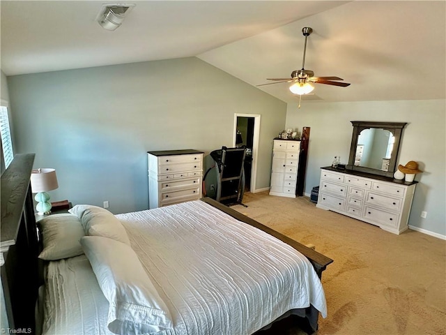 bedroom with ceiling fan, light carpet, and lofted ceiling