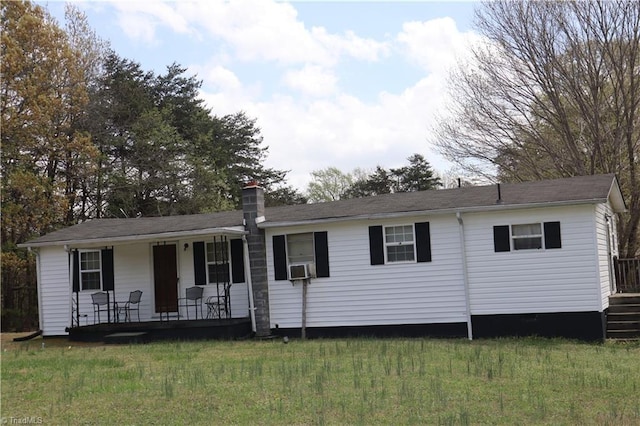 84 Sol Nunnally Rd, Pelham, NC 27311 - view of front facade featuring a porch and a chimney