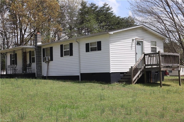 84 Sol Nunnally Rd, Pelham, NC 27311 - rear view of property with crawl space, a lawn, a porch, and a chimney