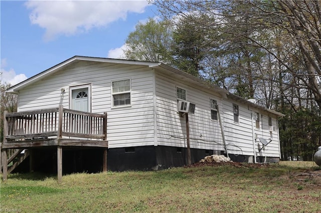 84 Sol Nunnally Rd, Pelham, NC 27311 - back of property with crawl space, a wooden deck, and a yard